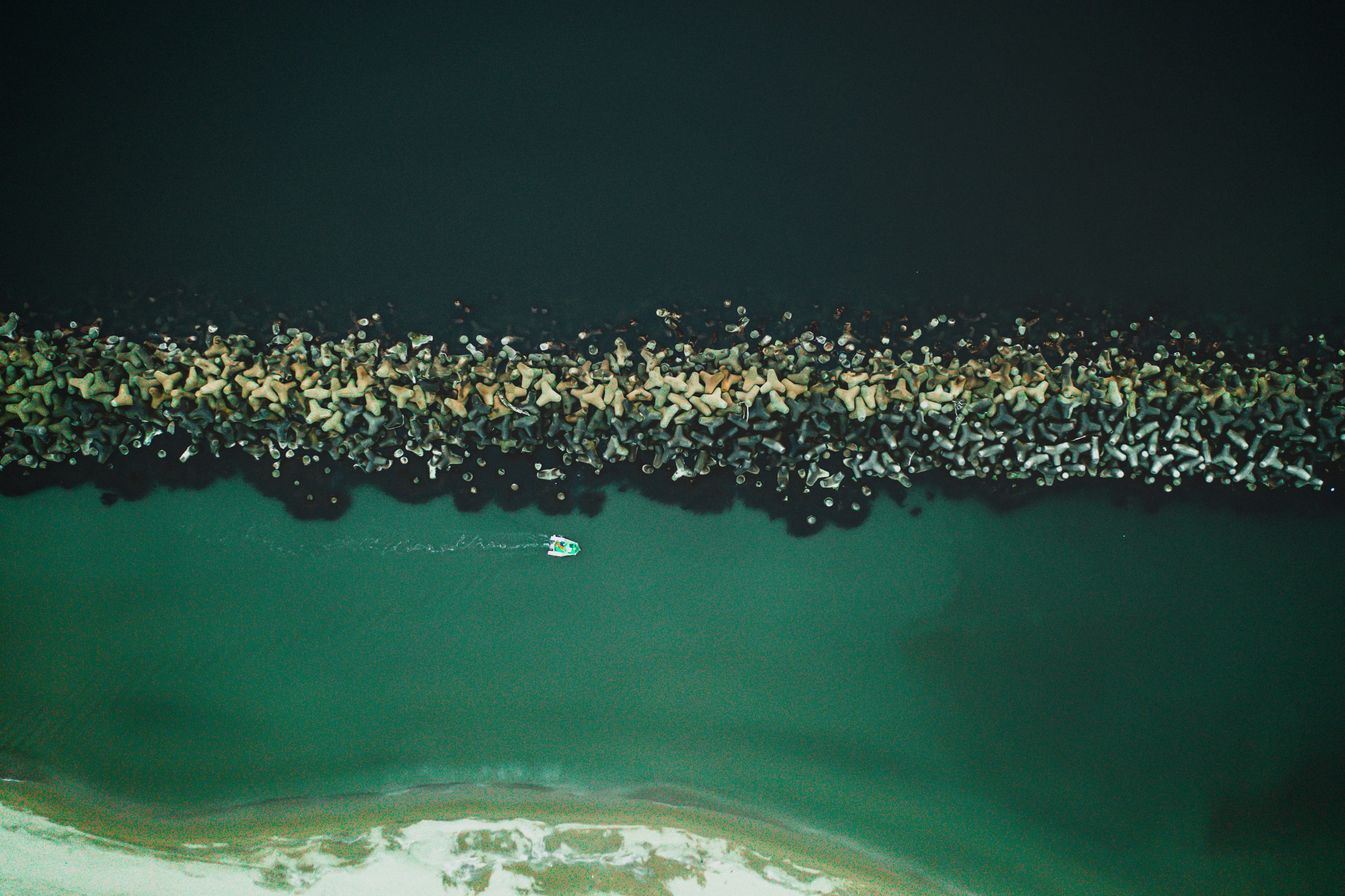 aerial photo of boat on body of water